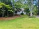 Ranch home with carport and landscaped yard at 2606 Ramblewood Ct, Acworth, GA 30102
