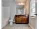 Bathroom boasts a vanity with granite countertop at 3312 Pennington Dr, Lithonia, GA 30038