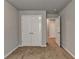 Bedroom with double door closet and neutral carpeting at 3312 Pennington Dr, Lithonia, GA 30038