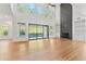 Two story great room with hardwood floors, fireplace and sliding doors at 2899 Treeside Terrace, Marietta, GA 30066