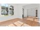 Bright dining room with hardwood floors and views of the living room and entryway at 2899 Treeside Terrace, Marietta, GA 30066