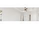 Spacious bedroom with ceiling fan and access to bathroom at 2899 Treeside Terrace, Marietta, GA 30066