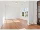 Bright office space with hardwood floors and a large window at 2899 Treeside Terrace, Marietta, GA 30066