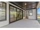 Covered patio with glass doors leading to the kitchen at 2899 Treeside Terrace, Marietta, GA 30066