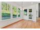 Bright breakfast nook with hardwood floors, large windows, and access to backyard at 2899 Treeside Terrace, Marietta, GA 30066