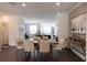 Bright dining room with hardwood floors and modern decor at 630 Skytop Dr # 157, Cumming, GA 30040