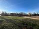 Spacious property with a pond and red barn at 6225 Collins Nw Rd, Acworth, GA 30101