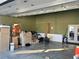 Unfinished garage with additional storage space at 6225 Collins Nw Rd, Acworth, GA 30101
