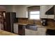 Updated kitchen with granite counters and stainless steel appliances at 6225 Collins Nw Rd, Acworth, GA 30101