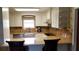 Bright kitchen with granite countertops and stainless steel appliances at 6225 Collins Nw Rd, Acworth, GA 30101
