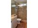 Updated bathroom with granite countertop and glass shower at 6225 Collins Nw Rd, Acworth, GA 30101