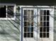 White french doors on shed exterior at 6225 Collins Nw Rd, Acworth, GA 30101