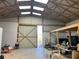 Bright barn interior with high ceilings, open space, and a loft area at 6225 Collins Nw Rd, Acworth, GA 30101