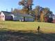 Brick ranch home with sunroom and large yard at 6225 Collins Nw Rd, Acworth, GA 30101