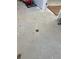 Unfinished concrete floor with a drain in the center at 6225 Collins Nw Rd, Acworth, GA 30101