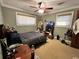 Bedroom with ceiling fan and window coverings at 6225 Collins Nw Rd, Acworth, GA 30101