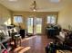 Sunroom with tiled floors and access to the backyard at 6225 Collins Nw Rd, Acworth, GA 30101