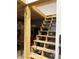 Unfinished wooden stairs leading to an upper level at 6225 Collins Nw Rd, Acworth, GA 30101