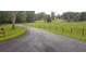 Long private driveway leading to a charming countryside home at 6225 Collins Nw Rd, Acworth, GA 30101