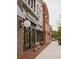 Brick-lined street with boutique shops and outdoor lighting at 631 Skytop Dr, Cumming, GA 30040