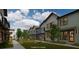 Exterior view of townhouses with a shared courtyard and green space at 1070 Dill Sw Ave, Atlanta, GA 30310