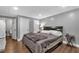 Basement bedroom with queen bed and ensuite bathroom at 186 Thorn Creek Way, Dallas, GA 30157