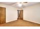 Bedroom with two closets and brown carpet at 2802 Leisure Woods Ln, Decatur, GA 30034