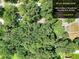 Aerial view of property showing lot size and wooded surroundings at 2802 Leisure Woods Ln, Decatur, GA 30034