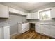 Updated kitchen, featuring white cabinets and a window overlooking the backyard at 3283 Blazing Pine Knl # A, Decatur, GA 30034