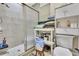Bathroom includes a shower, toilet, and linen storage at 5833 Wind Haven Nw Ct, Kennesaw, GA 30152