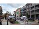 Vibrant town square with shops and people enjoying a sunny day at 2280 Park Walke Dr, Alpharetta, GA 30009