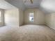 Large bedroom with vaulted ceiling and carpet at 4024 Waldrop Hills Dr, Decatur, GA 30034