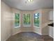 Bright dining area with large windows and tile floor at 4024 Waldrop Hills Dr, Decatur, GA 30034