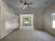Spacious bedroom with large window and ceiling fan at 4024 Waldrop Hills Dr, Decatur, GA 30034