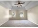 Spacious main bedroom with ceiling fan and carpet at 4024 Waldrop Hills Dr, Decatur, GA 30034