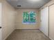 Spacious bedroom with large window and barn door at 4024 Waldrop Hills Dr, Decatur, GA 30034