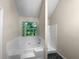 Bathroom with a bathtub and shower at 4024 Waldrop Hills Dr, Decatur, GA 30034