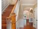 Elegant staircase with wood railing and hardwood floors at 775 Mountain View Nw Ter, Marietta, GA 30064