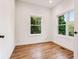 Well-lit bedroom with hardwood floors and windows at 1617 Lenox Rd, Atlanta, GA 30306