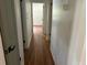 Clean hallway with hardwood floors and light walls at 2381 County Line Sw Rd, Atlanta, GA 30331