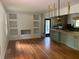 Spacious dining room with hardwood floors and built-in shelving at 2381 County Line Sw Rd, Atlanta, GA 30331