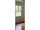 Bright bedroom with hardwood floors and large window at 2381 County Line Sw Rd, Atlanta, GA 30331