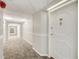 Clean and well-lit hallway with carpeted floors at 2479 Peachtree Ne Rd # 304, Atlanta, GA 30305