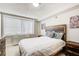 Comfortable bedroom with a queen-size bed and wood dresser at 2479 Peachtree Ne Rd # 304, Atlanta, GA 30305