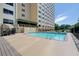 Refreshing swimming pool with brick coping and surrounding deck at 2479 Peachtree Ne Rd # 304, Atlanta, GA 30305