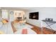 Spacious living room featuring hardwood floors and comfy sectional sofa at 2479 Peachtree Ne Rd # 304, Atlanta, GA 30305