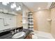 Updated bathroom with granite vanity and tiled shower/tub at 2479 Peachtree Ne Rd # 304, Atlanta, GA 30305