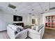 Relaxing common area with plush seating and a large TV at 2479 Peachtree Ne Rd # 304, Atlanta, GA 30305