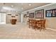Finished basement recreation room with game table and seating area at 738 Key Largo Ct, Auburn, GA 30011