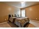 Bedroom with carpeted floor, neutral walls, and a large window at 738 Key Largo Ct, Auburn, GA 30011